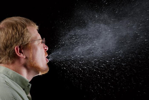 Man Sneezing Germs Shown Spreading