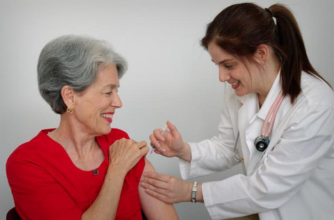 Woman in her late 50s Receiving an Immunization