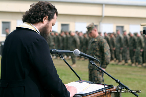Romanian Priest Blesses Army Base