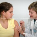 Twelve Year Old Girl Receiving a Flu Vaccination