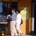 Couple walking outside wine store in Grapevine, TX