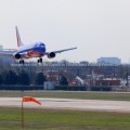 Southwest Airlines 737 Landing in Dallas TX (Reunion Tower in Background)